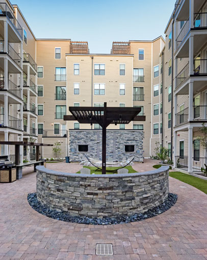 Courtyard with hammocks and lounge seating